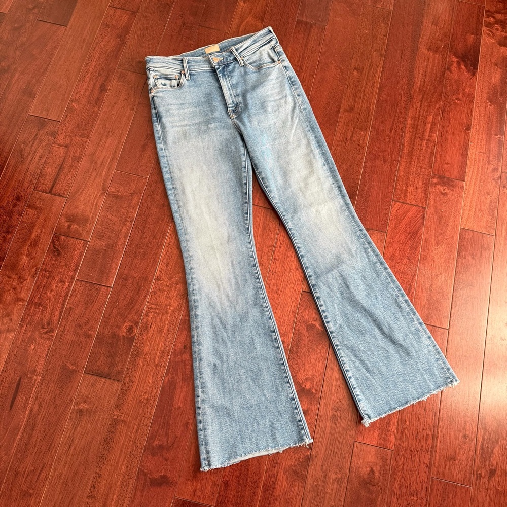 MOTHER Light Wash Blue Flare Jeans